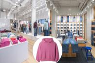 A Gap store display featuring a pink hoodie and jeans